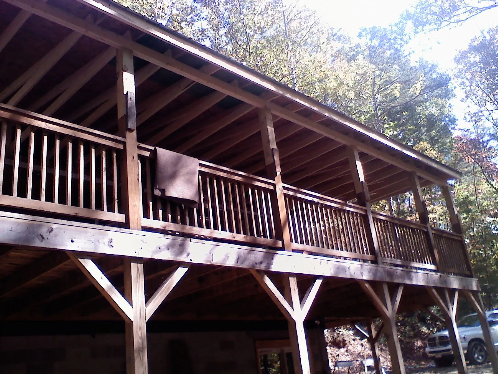 Timber framing under a new elevated porch and deck — Roof Leak Repair in Umpqua by Roofing Brothers
